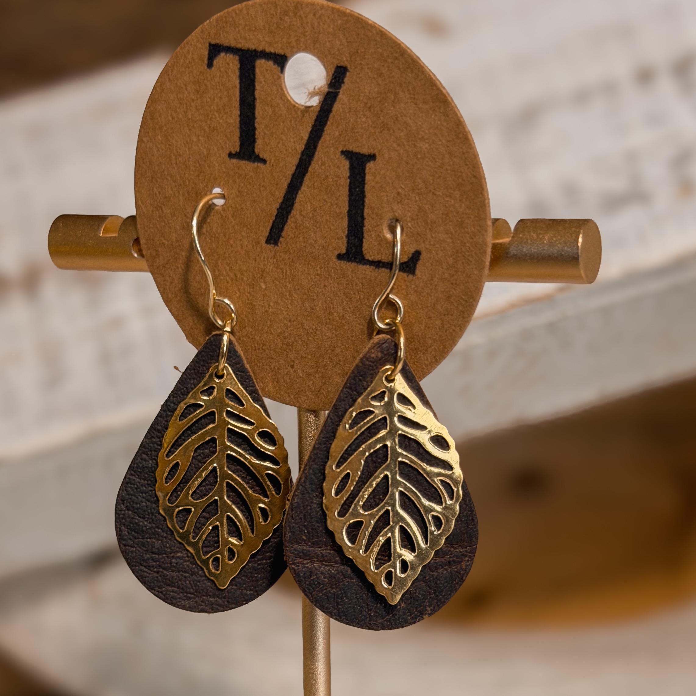Leather earrings with leaf accent